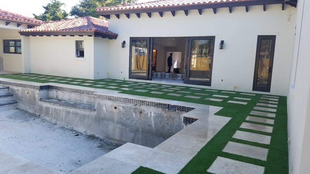 a pool in a building smart synthetic turf