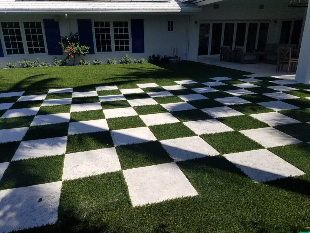 a checkered lawn in front of a house smart synthetic turf