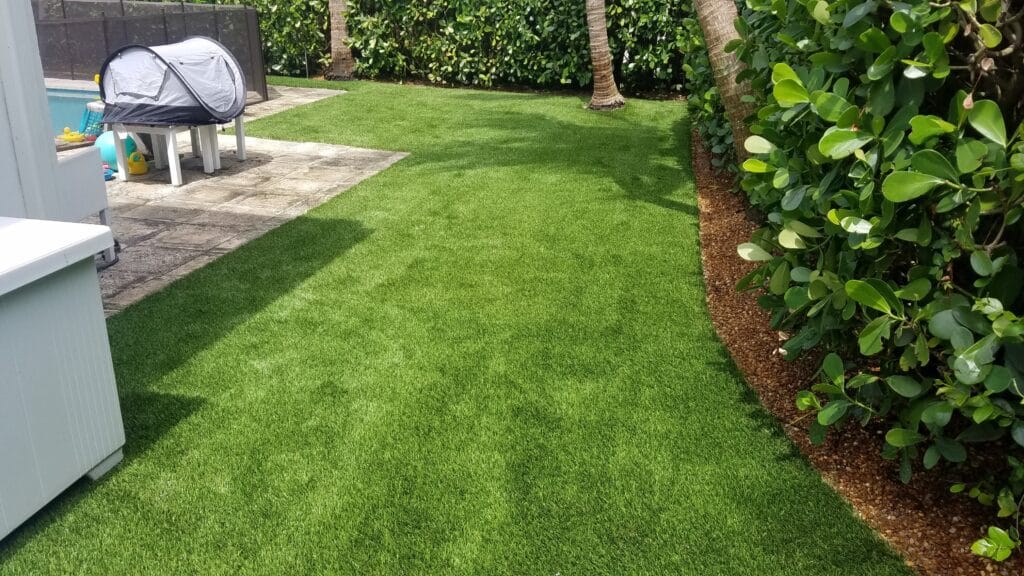 a lawn with trees and bushes smart synthetic turf
