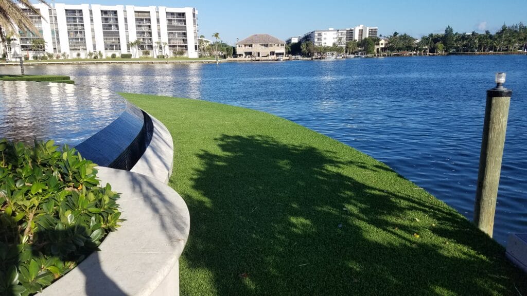 a water next to a body of water smart synthetic turf