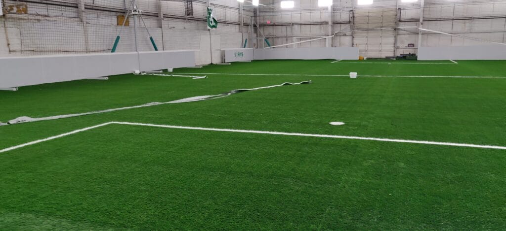 smart synthetic turf tennis court installation